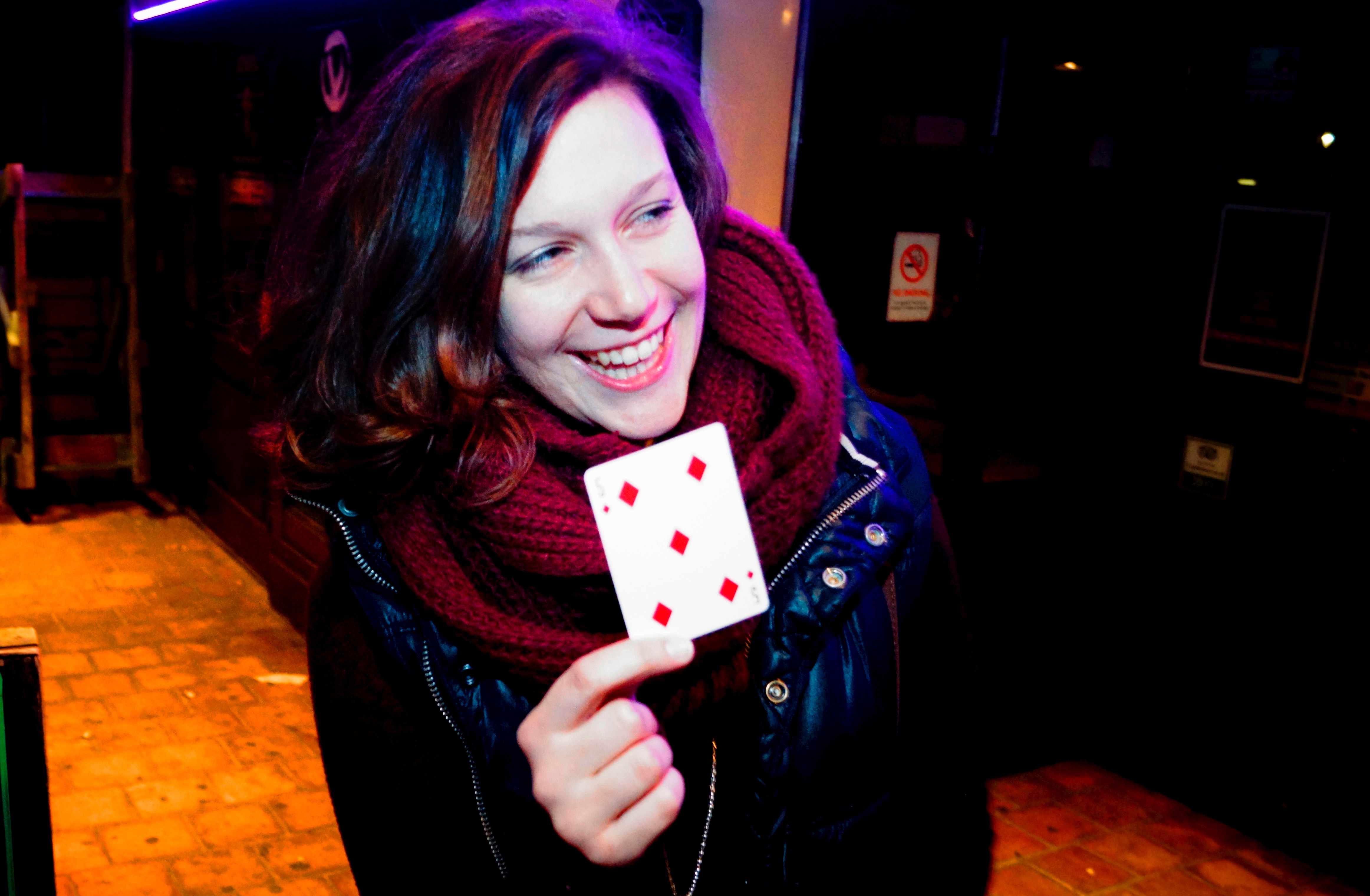 Street Magician Liam Walsh performing close up magic at SOUND Party in Chichester